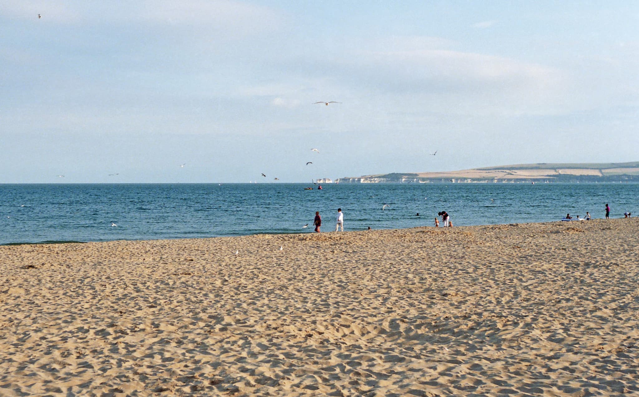 Sandbanks Beach, Poole, looking across the bay towards Old Harry Rocks