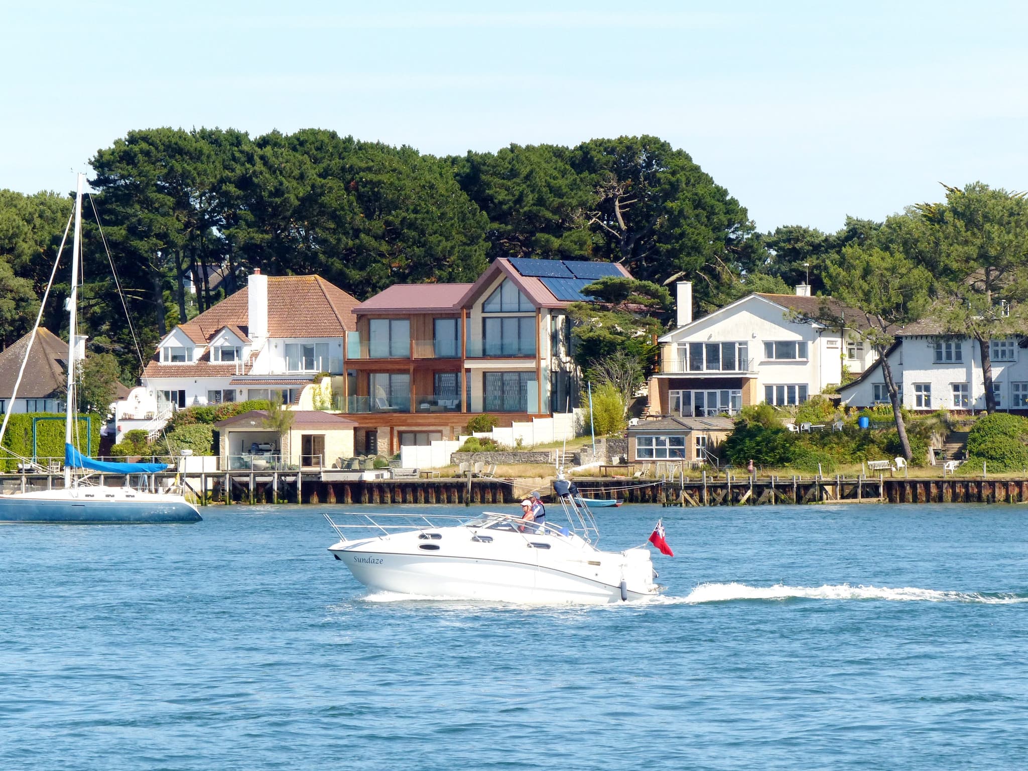 Harbour-side houses at Sandbanks, Poole, viewed from the water